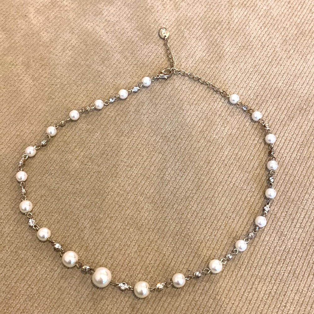 Icing pearl and silver toned necklace